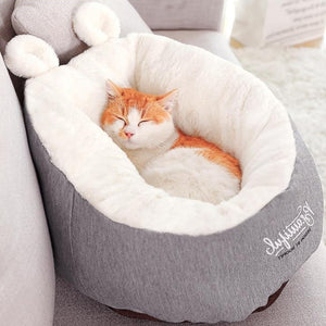 Cama de peluche cálida para gato