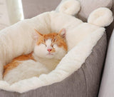 Cama de peluche cálida para gato